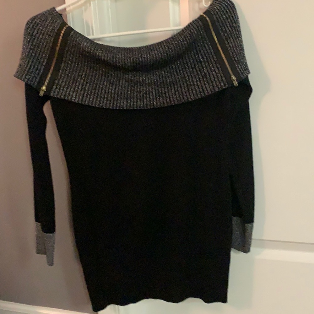Black sweater with silver glitz.